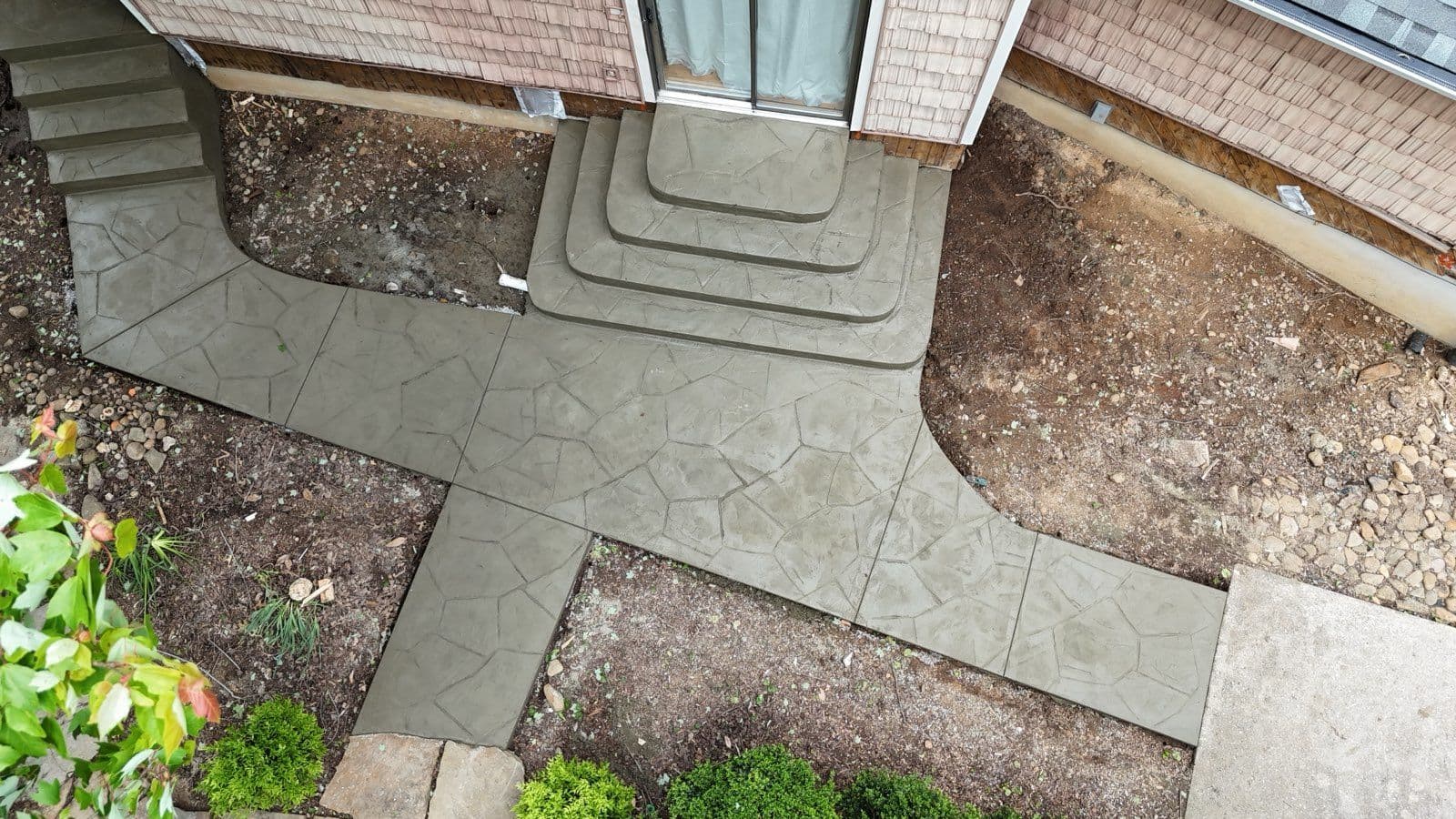 Stamped Concrete Walkway Enhances Spring City Home image